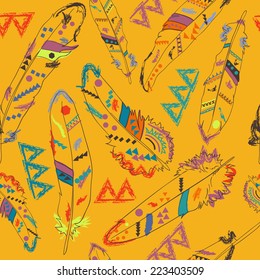 Seamless pattern with feathers in american indians style