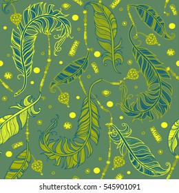 Seamless pattern with feathers, beads and hearts in bohemian style. Green palette.