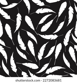 Seamless pattern with feathers on a black background