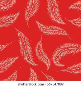 Seamless pattern of feathers on red background.
