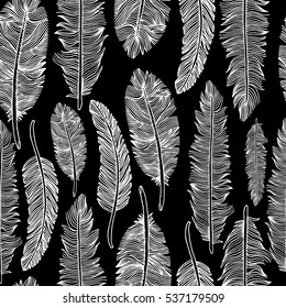 Seamless pattern of feathers .Vector illustration of tribal style.