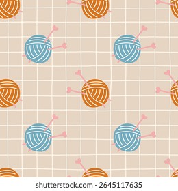 Padrão sem emenda com bolas de fio coloridas, agulhas de tricô em tons de outono acolhedor. Projeto de vetor desenhado à mão perfeito para a elaboração de têxteis, papel de embrulho e roupas infantis.