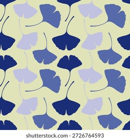 A seamless pattern featuring stylized ginkgo leaves in various shades of blue and purple, arranged repetitively on a light yellow background, creating a serene and natural design.