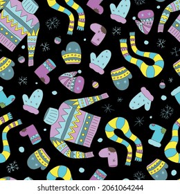 Seamless pattern with felt boots and mittens. Vector. Christmas background. Cartoon. Hand Drawn in Doodle Style