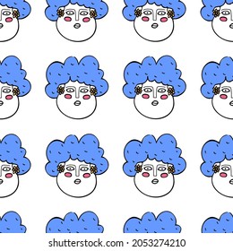A seamless pattern with female comic faces. Vector illustration in doodle style with bright accents.