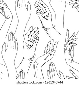 Seamless pattern of female hands on white background.