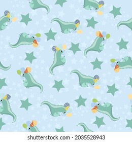 Seamless pattern with festive green dinosaurs and balloons. Pattern on a blue background with stars for printing, for children's party.