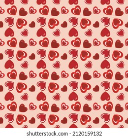 Seamless pattern .Festive hearts on a pink background . It is well suited for wrapping paper, wedding invitations, textiles and backgrounds.