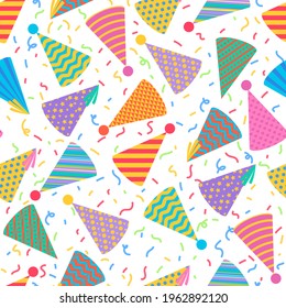 Seamless pattern with festive paper caps and confetti. Hats for the party. Vector illustration