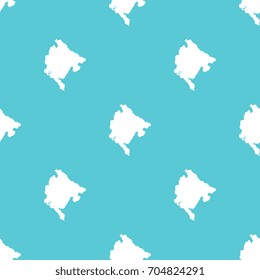 seamless pattern filled with maps of montenegro. white country silhouettes on blue background