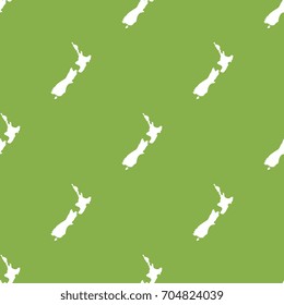 seamless pattern filled with maps of new zealand. white country silhouettes on green background