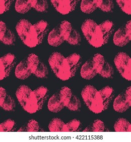 Seamless pattern with fingerprint hearts. Hand drawn shapes with rough edges. Trendy texture. Endless stylish backdrop. Pink thumbprints on black background. Fabric, wallpaper, wrapping