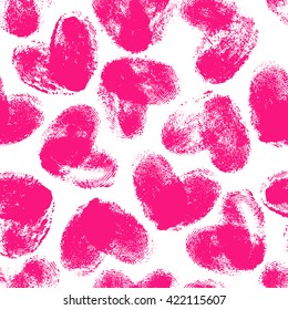 Seamless pattern with fingerprint hearts. Hand drawn shapes with rough edges. Trendy texture. Endless stylish backdrop. Pink thumbprints on black background. Fabric, wallpaper, wrapping