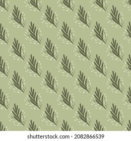 Seamless pattern fir twig on light green background. Vector geometric template in doodle style. Christmas forest texture for fabric, wrapping paper, wallpaper, tissue.
