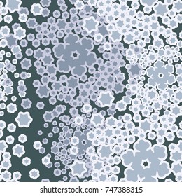 Seamless pattern. Five-color palette. Snowy whirlwinds among which are visible individual snowflakes.