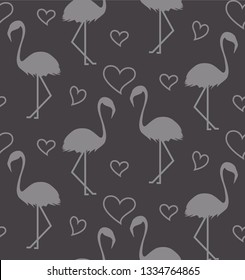 Seamless pattern with flamihgo and hearts on the grey background