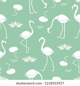 Seamless pattern with flamingo, flowers and leaves water lilies. Design for poster or print.