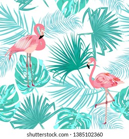 Seamless pattern of flamingo, leaves monstera. Tropical leaves of palm tree and flowers. Vector background.