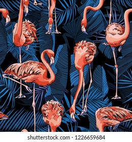 Seamless pattern. Flamingo and a Tropical banana, exotic palm leaves at a dark blue night. Textile composition, hand drawn style print. Vector illustration.