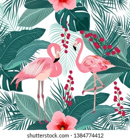 Seamless pattern of flamingo, tropical leaves of palm tree. Vector background.