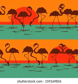 Seamless pattern of flamingos at sunset or sunrise