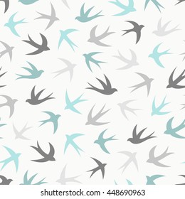 Seamless pattern with a flock of swallows. Vintage background of silhouettes of birds in the sky. Vector illustration.
