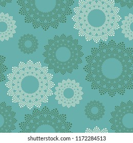 seamless pattern with floral flakes in ivory green blue shades