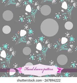 Seamless pattern of floral motif, ellipses, bouquets,circles, label. Hand drawn.