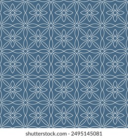 Seamless pattern of floral ornament shapes, with white curved lines on a denim blue background. Suitable for various decorative purposes with a natural theme.