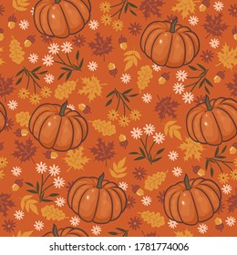 Seamless pattern with flowers, autumn leaves and pumpkins. Vector graphics.