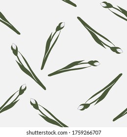 Seamless pattern with flowers, buds and green leaves of iris flowers on a gray-blue background.