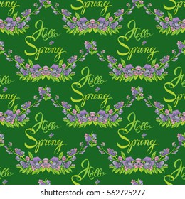 Seamless pattern with flowers and calligraphic handwritten text Hello Spring on green backdrop - hand drawn background.