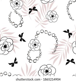 Seamless pattern of flowers of Camellia, black ribbons, beads and palm leafs in the background. Good for textile, fabric, stationary, cover, wallpaper, wrapping wrap, card, greeting card.