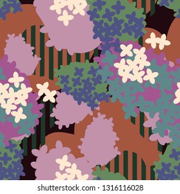 Seamless pattern with flowers at coloured background. 