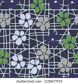 Seamless pattern. Flowers depicted in a hurry and are located chaotically. Against the background of a grid consisting of divided squares.