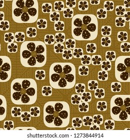 Seamless pattern. Flowers enclosed in oval squares. The colors of gold. Background consisting of wavy lines.