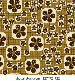 Seamless pattern. Flowers enclosed in oval squares. The colors of gold. Checkered background under which there are circular brush strokes.