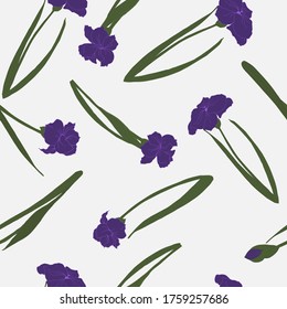 Seamless pattern with flowers and green leaves of iris flowers in blue on a gray-blue background.