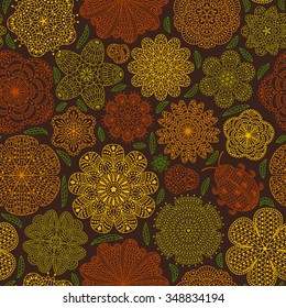 Seamless pattern with flowers and ladybug. Romantic floral background. Brown, orange, green an yellow colors. Detailed vector illustration. 