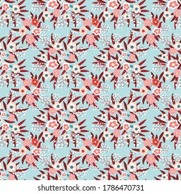 Seamless pattern of flowers and leaves. The floral ornament is located in a geometric order. Design for textile, paper, packaging, bedding. Vector illustration.