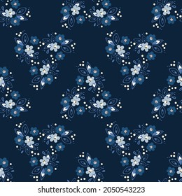 Seamless pattern of flowers and leaves. Floral ornament is arranged in random order. Design for textile, paper, packaging, bedding in a folk style. Vector flat illustration.