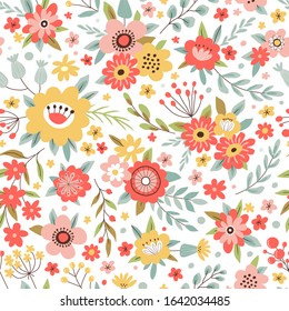 Seamless pattern with flowers, leaves and grass. Freehand drawing