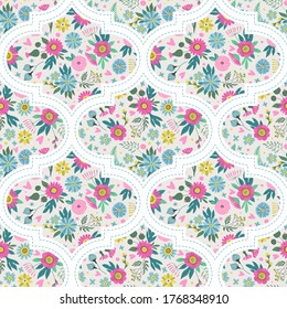 Seamless pattern with flowers, leaves and grass. Freehand drawing