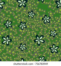 Seamless pattern. Flowers and leaves are scattered chaotically. Fashionable camouflage.