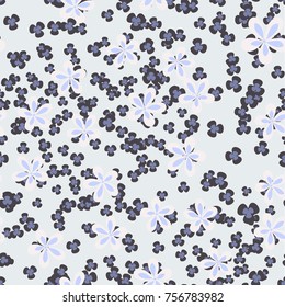 Seamless pattern. Flowers and leaves are scattered chaotically. Fashionable camouflage.
