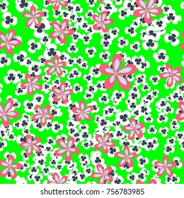 Seamless pattern. Flowers and leaves are scattered chaotically. Fashionable camouflage.