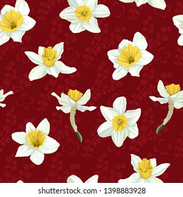 Seamless pattern with flowers of narcissus on a red background.