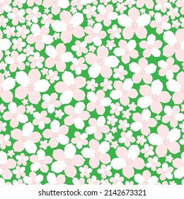 Patrón sin foco con flores sobre un fondo verde.