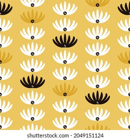 Patrón sin foco con flores sobre fondo amarillo. Diseño para tela y papel, texturas superficiales.