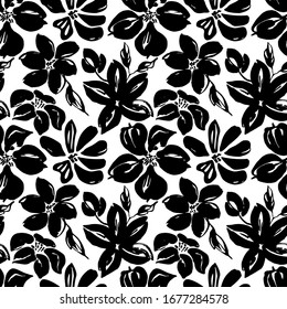 Seamless pattern of flowers painted with a dry brush. Black flowers on a white background. 
For wallpaper, fabric, wrapper, background.